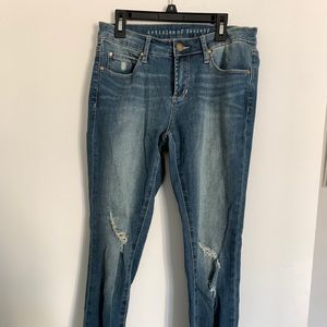 Soft/stretch mid rise distressed denim.